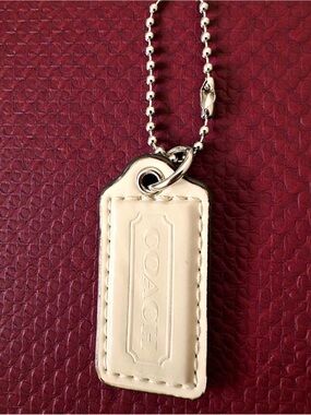 COACH Leather Hangtag | Bag Charm in Cream with Embossed Logo